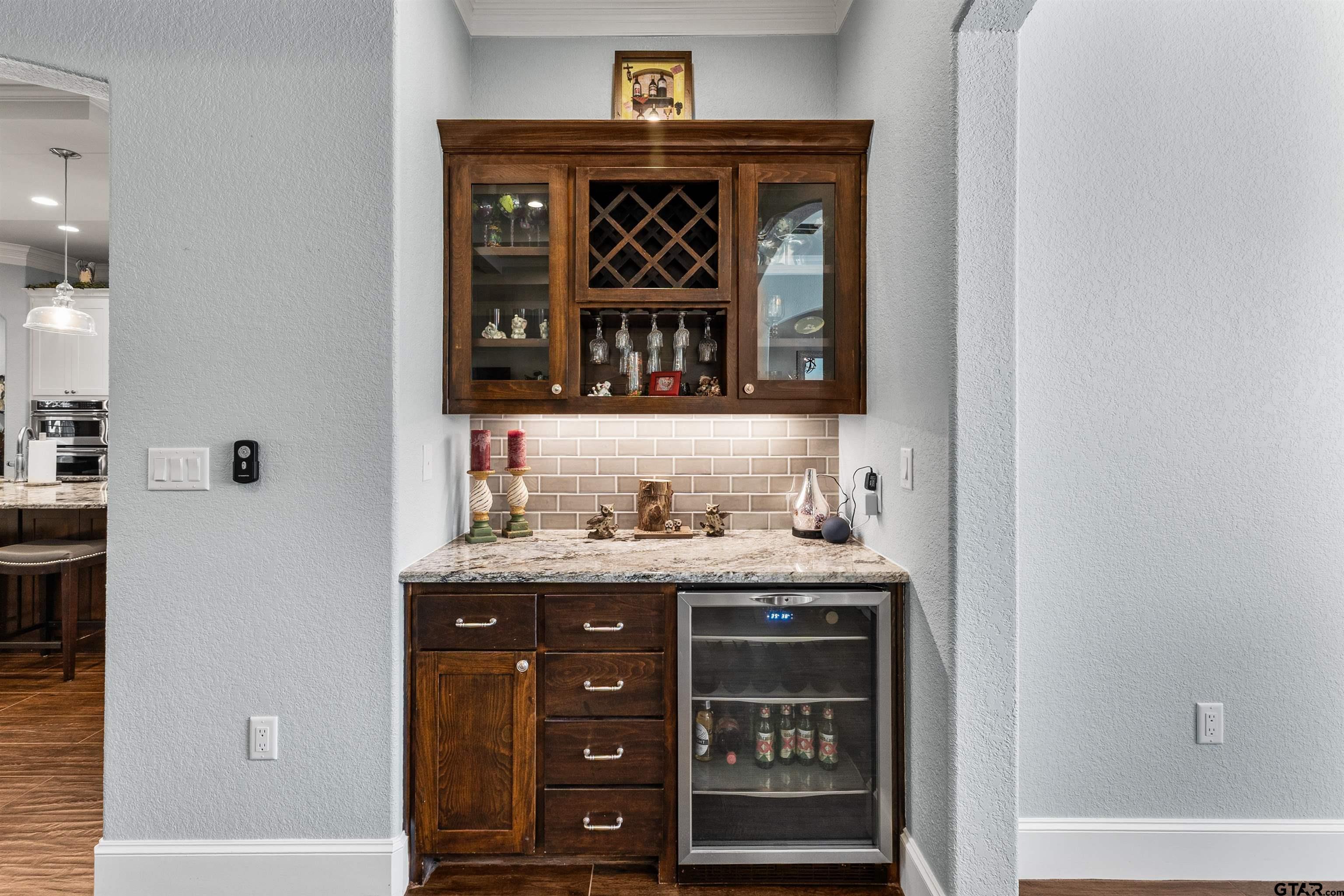 1111 Cambridge Bend Tyler, TX 75703 - Photo 14 of 42 a view of cabinets and window
