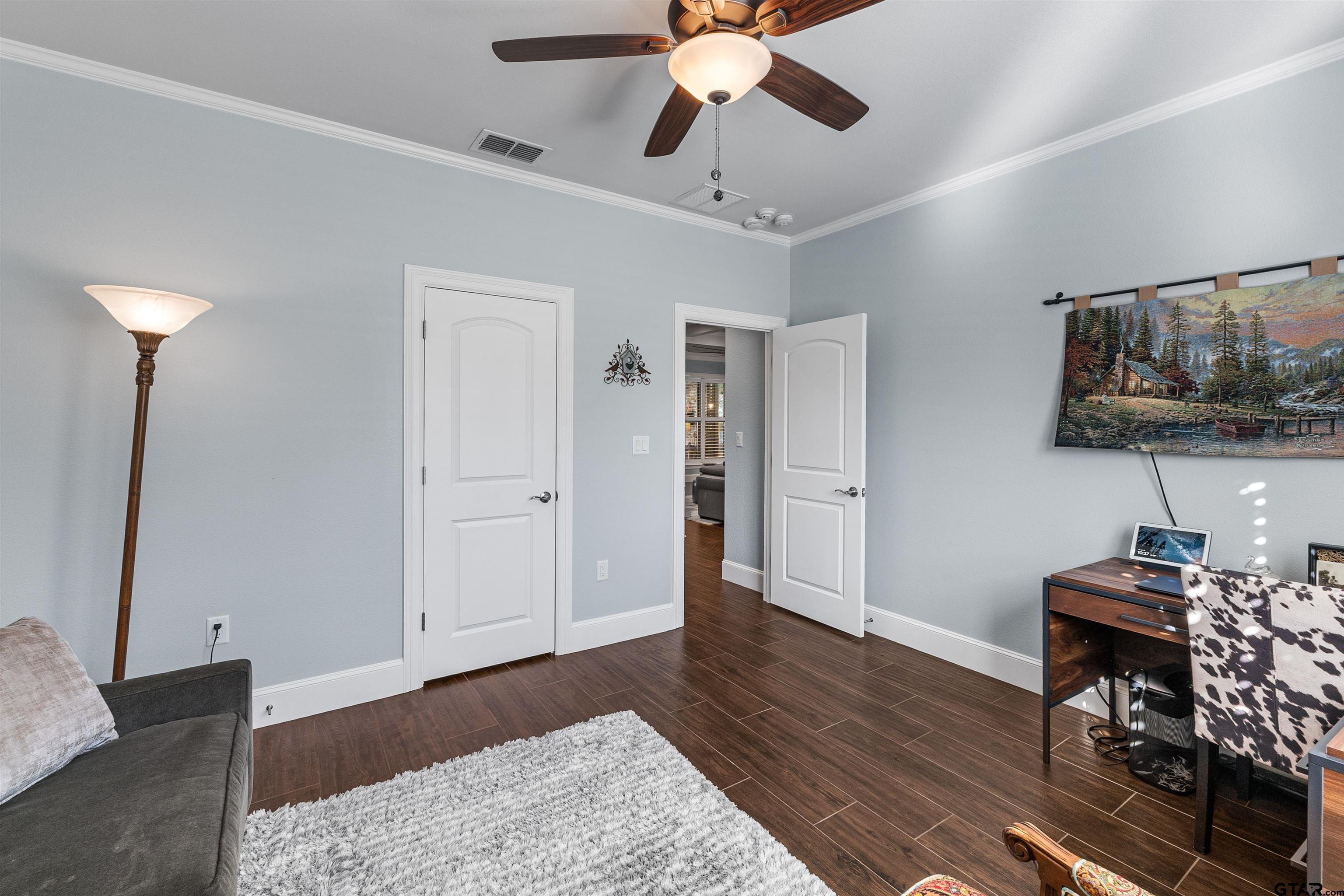1111 Cambridge Bend Tyler, TX 75703 - Photo 19 of 42 a view of a livingroom with furniture and wooden floor