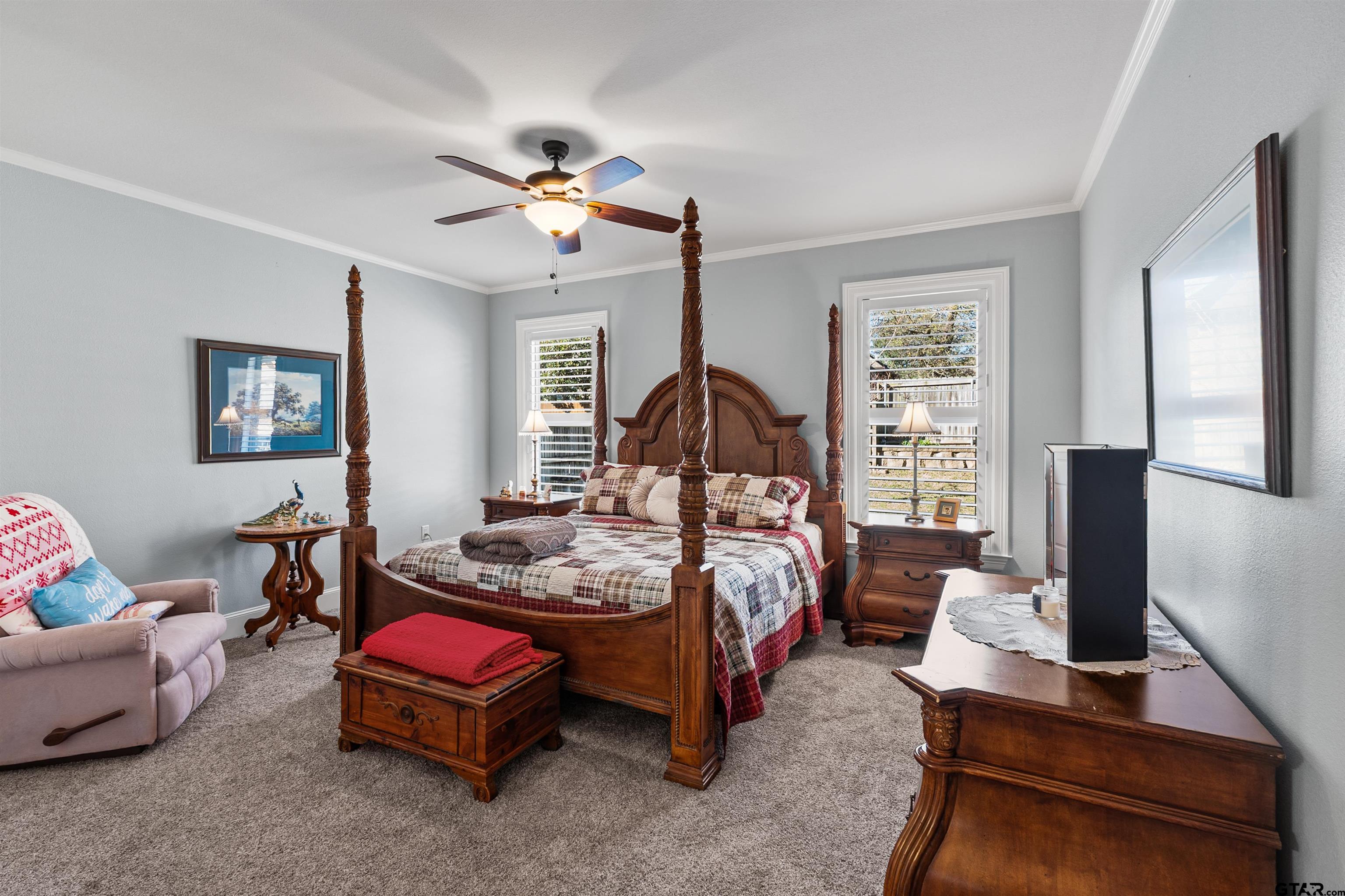 1111 Cambridge Bend Tyler, TX 75703 - Photo 26 of 42 a bedroom with a bed chair and window