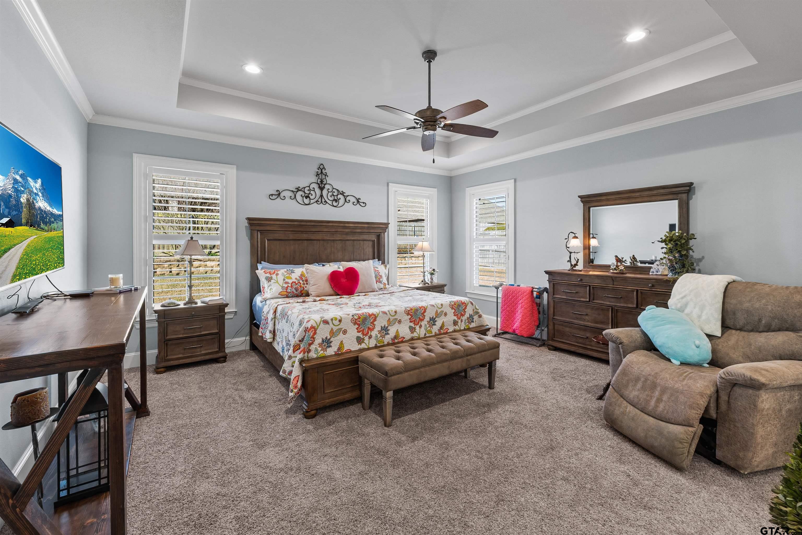 1111 Cambridge Bend Tyler, TX 75703 - Photo 29 of 42 a bed room with a bed window and a desk