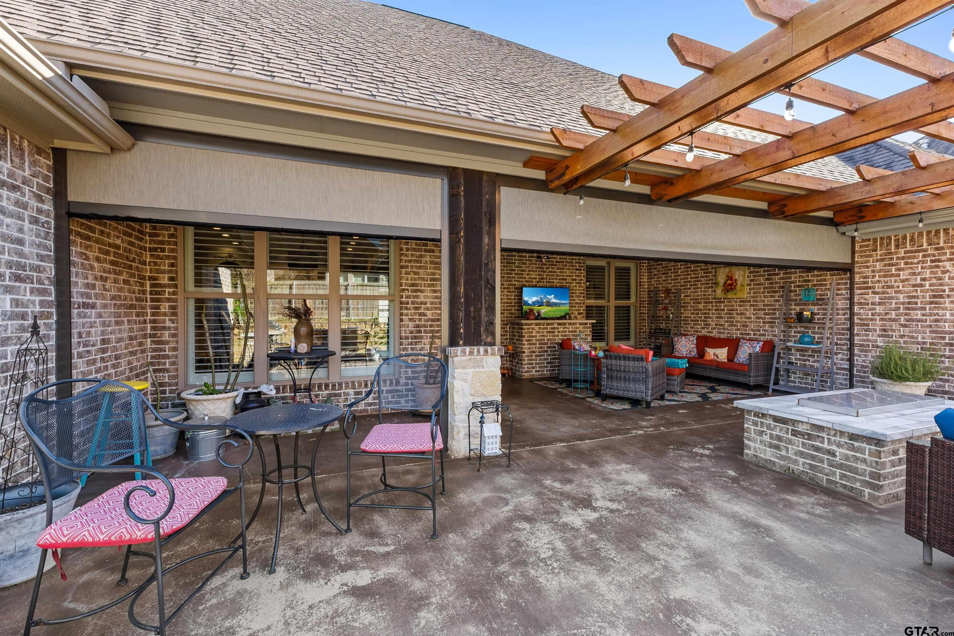 1111 Cambridge Bend Tyler, TX 75703 - Photo 38 of 42 a view of a chairs in a patio