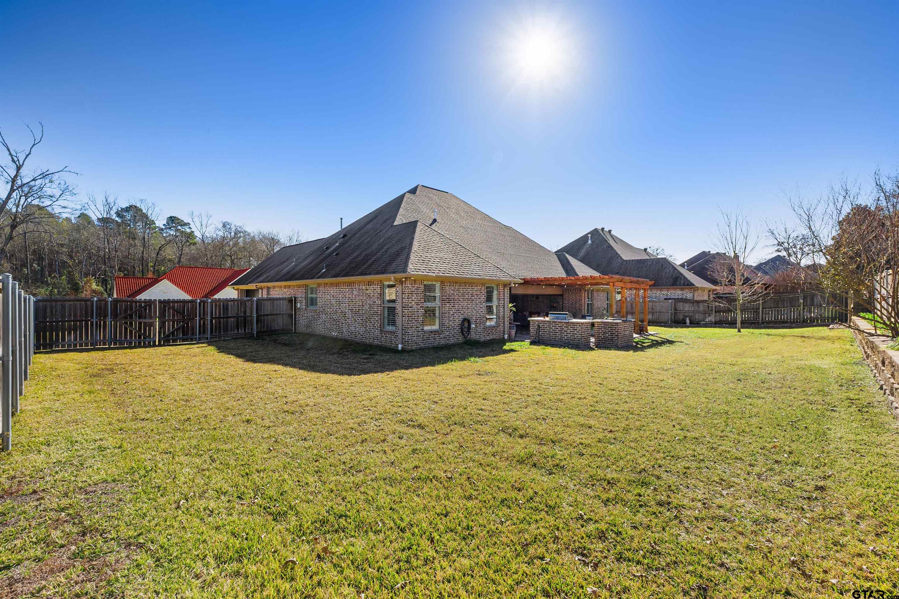 1111 Cambridge Bend Tyler, TX 75703 - Photo 40 of 42 a front view of house with an outdoor space and balcony
