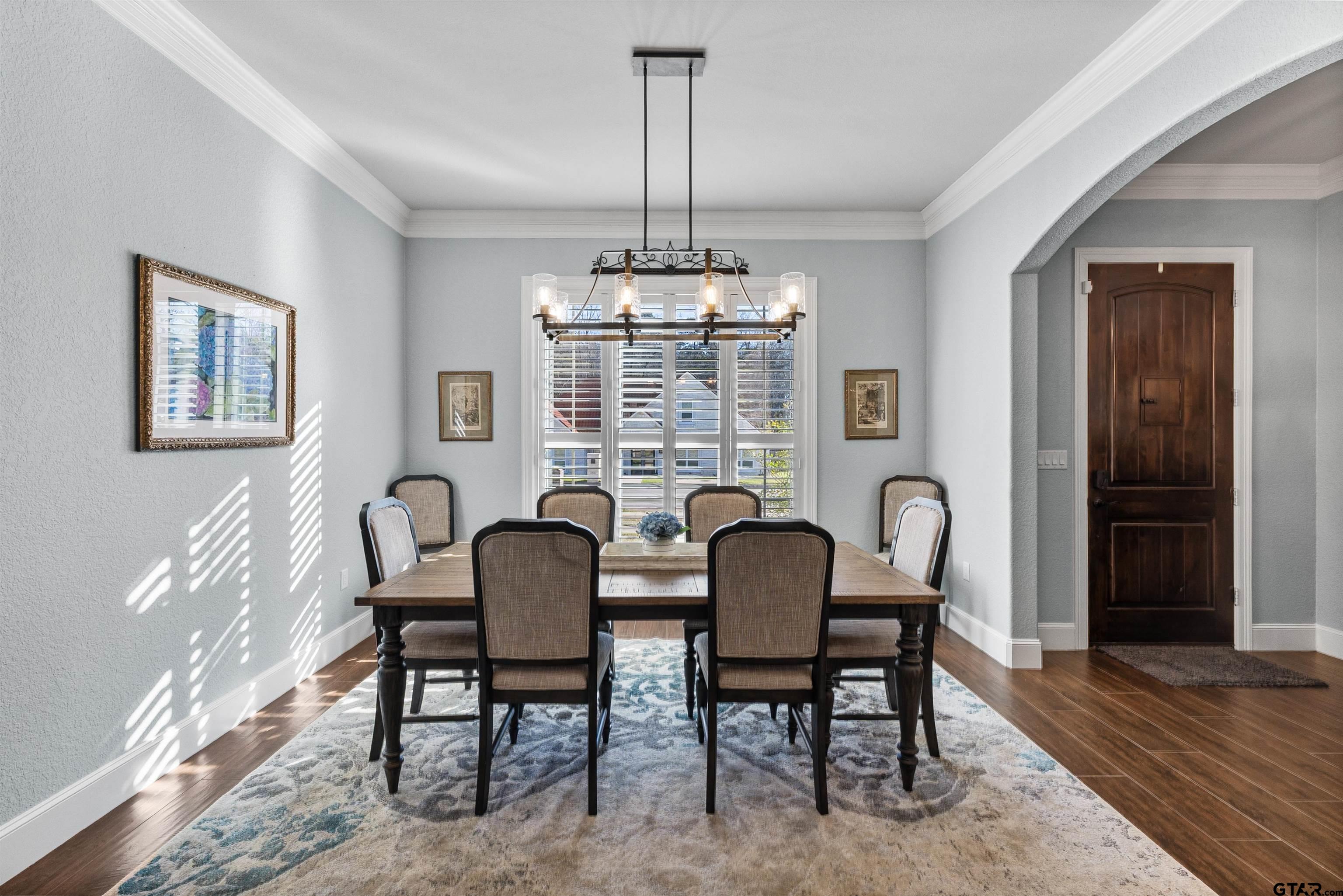 1111 Cambridge Bend Tyler, TX 75703 - Photo 4 of 42 a view of a dining room with furniture window and wooden floor