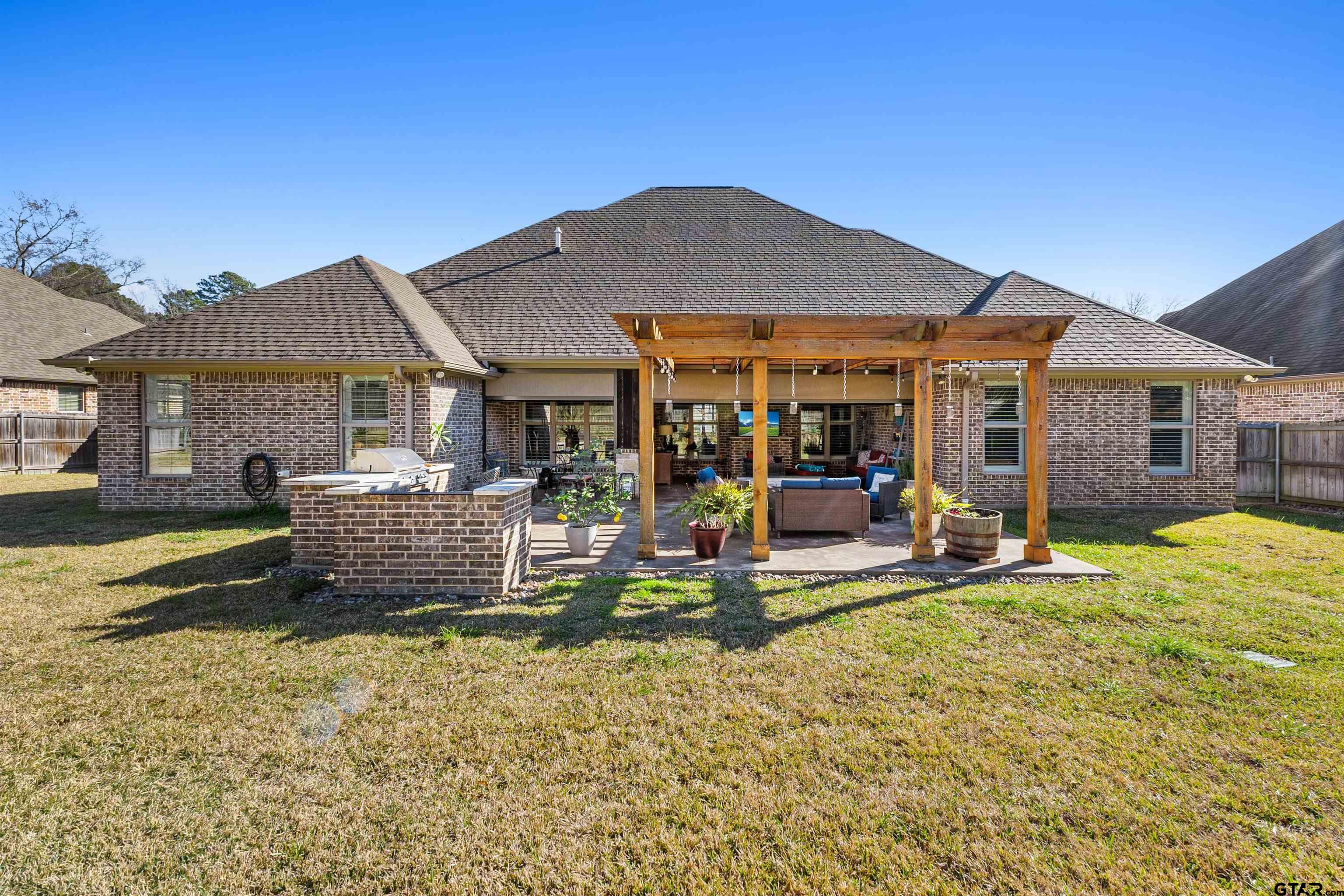 1111 Cambridge Bend Tyler, TX 75703 - Photo 42 of 42 a view of a house with pool and sitting area