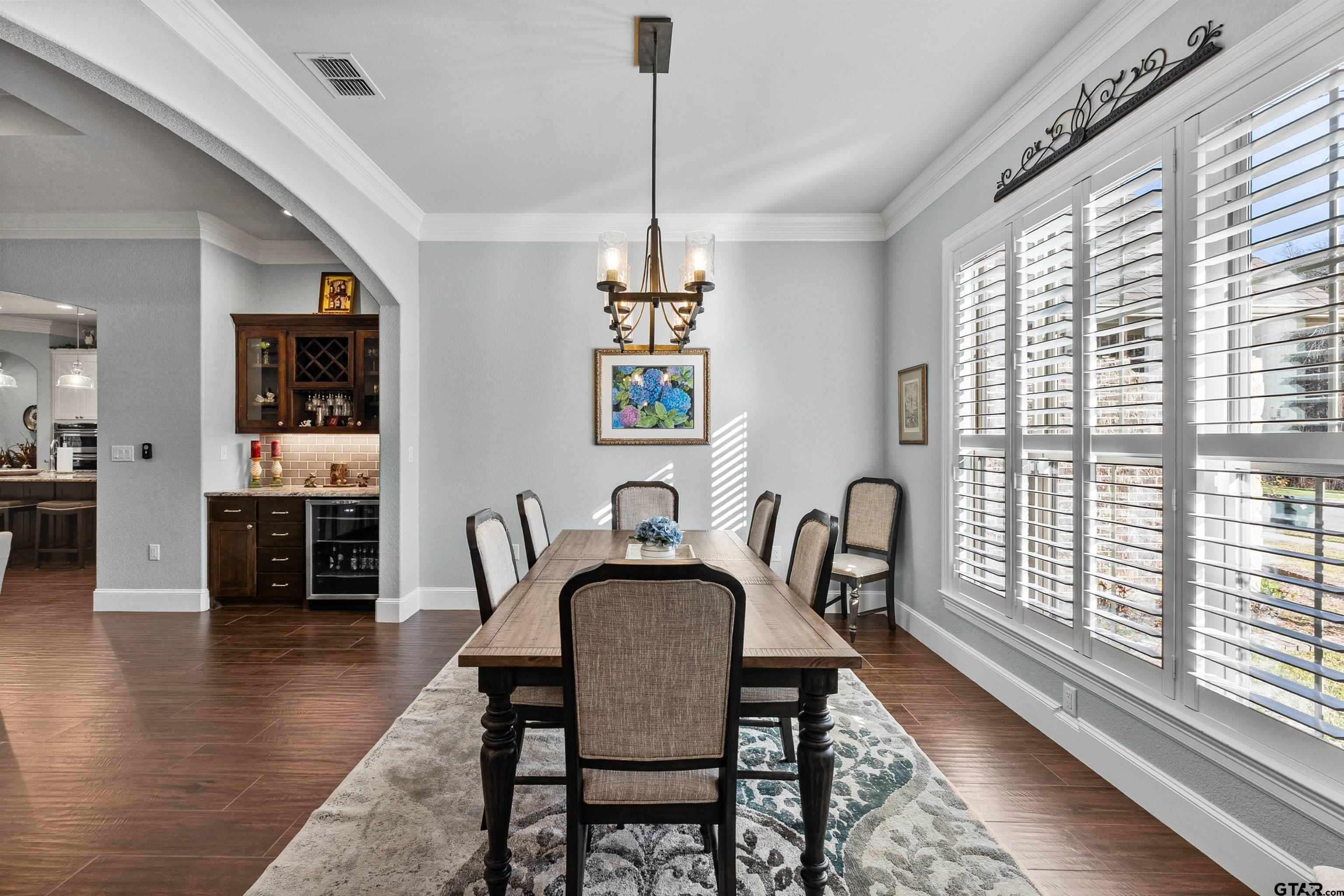 1111 Cambridge Bend Tyler, TX 75703 - Photo 5 of 42 a view of a dining room with furniture window and wooden floor