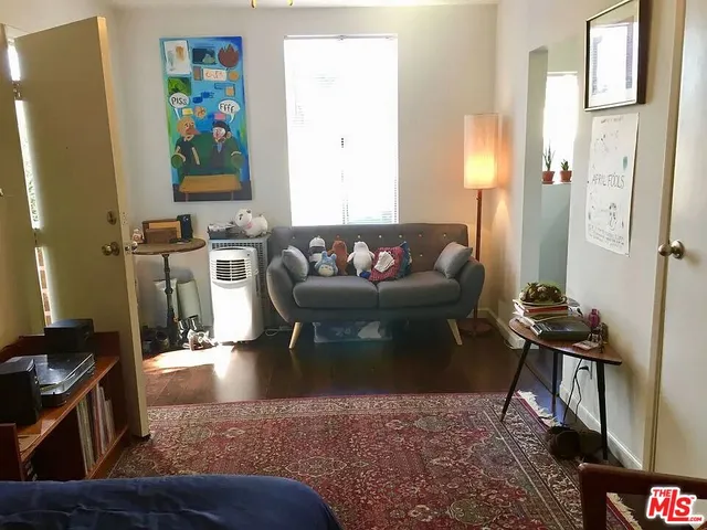 a white refrigerator freezer sitting inside of a kitchen