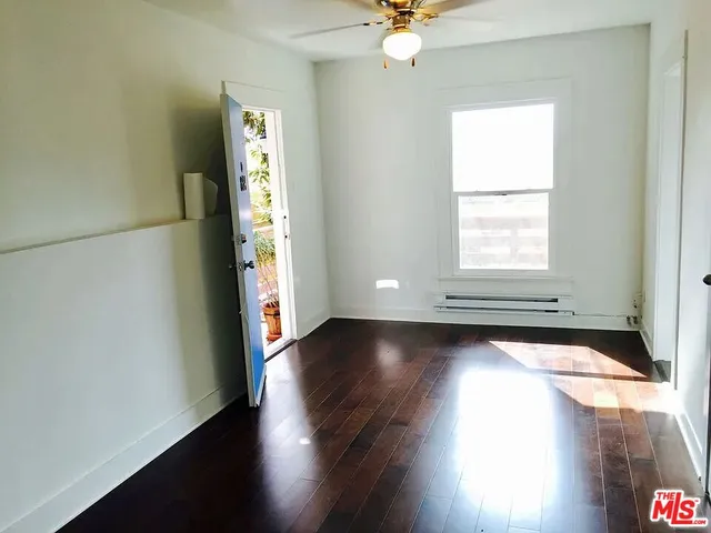 a white refrigerator freezer sitting inside of a kitchen