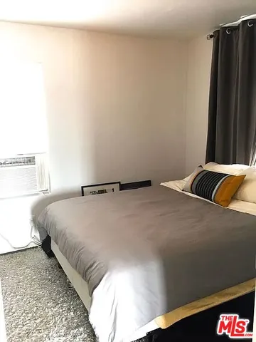 a bathroom with a sink a toilet and bathtub