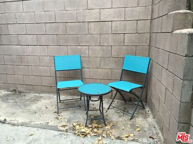 a bedroom with a bed and walk in closet