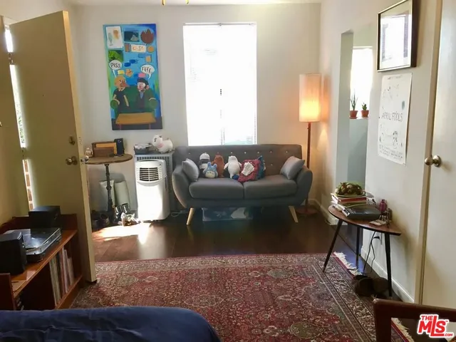 a bathroom with a sink a toilet and bathtub