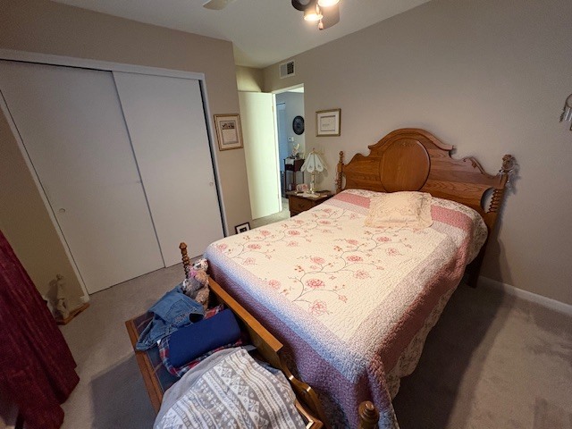 940 17th Street, Unit 7 Moline, IL 61265 - Photo 5 of 7 a bedroom with a bed and a dresser