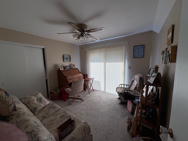 940 17th Street, Unit 7 Moline, IL 61265 - Photo 6 of 7 a living room with furniture and a gym cycle
