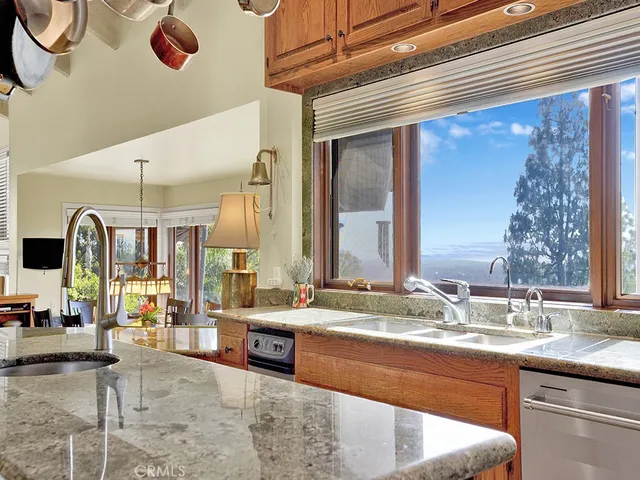 a view of balcony with wooden floor and outdoor seating