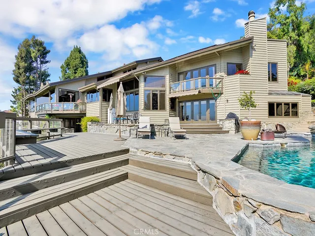 a view of a livingroom with furniture and a table
