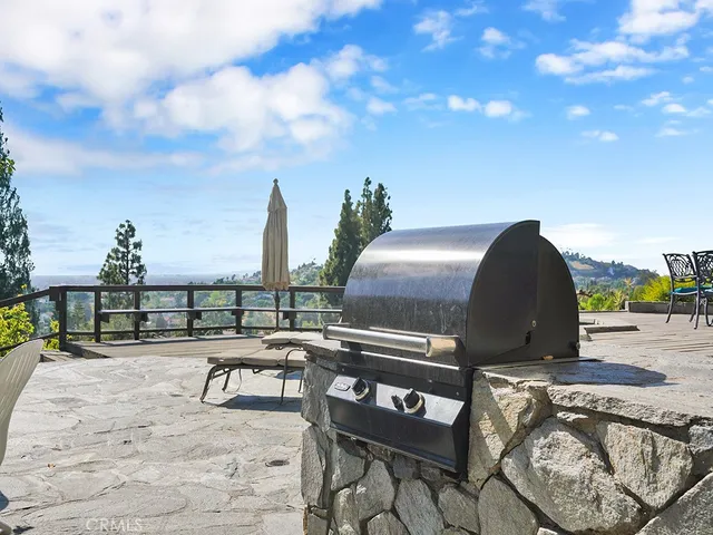 a living room with lots of furniture and a book shelf