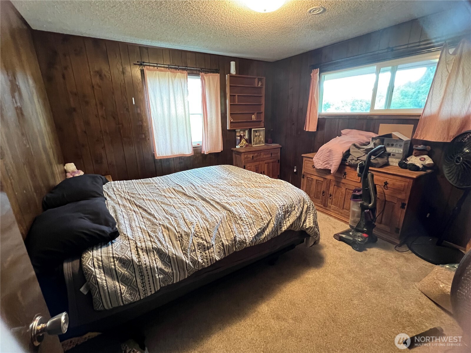 452 Lincoln Creek Road Centralia, WA 98531 - Photo 15 of 25 a bedroom with a bed and wooden floor