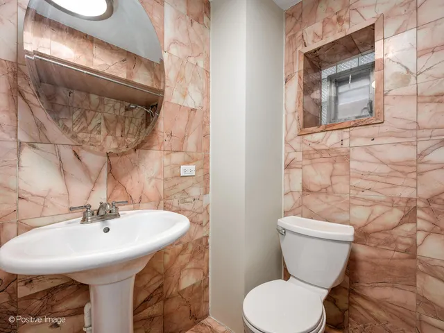 a bathroom with a sink and a toilet