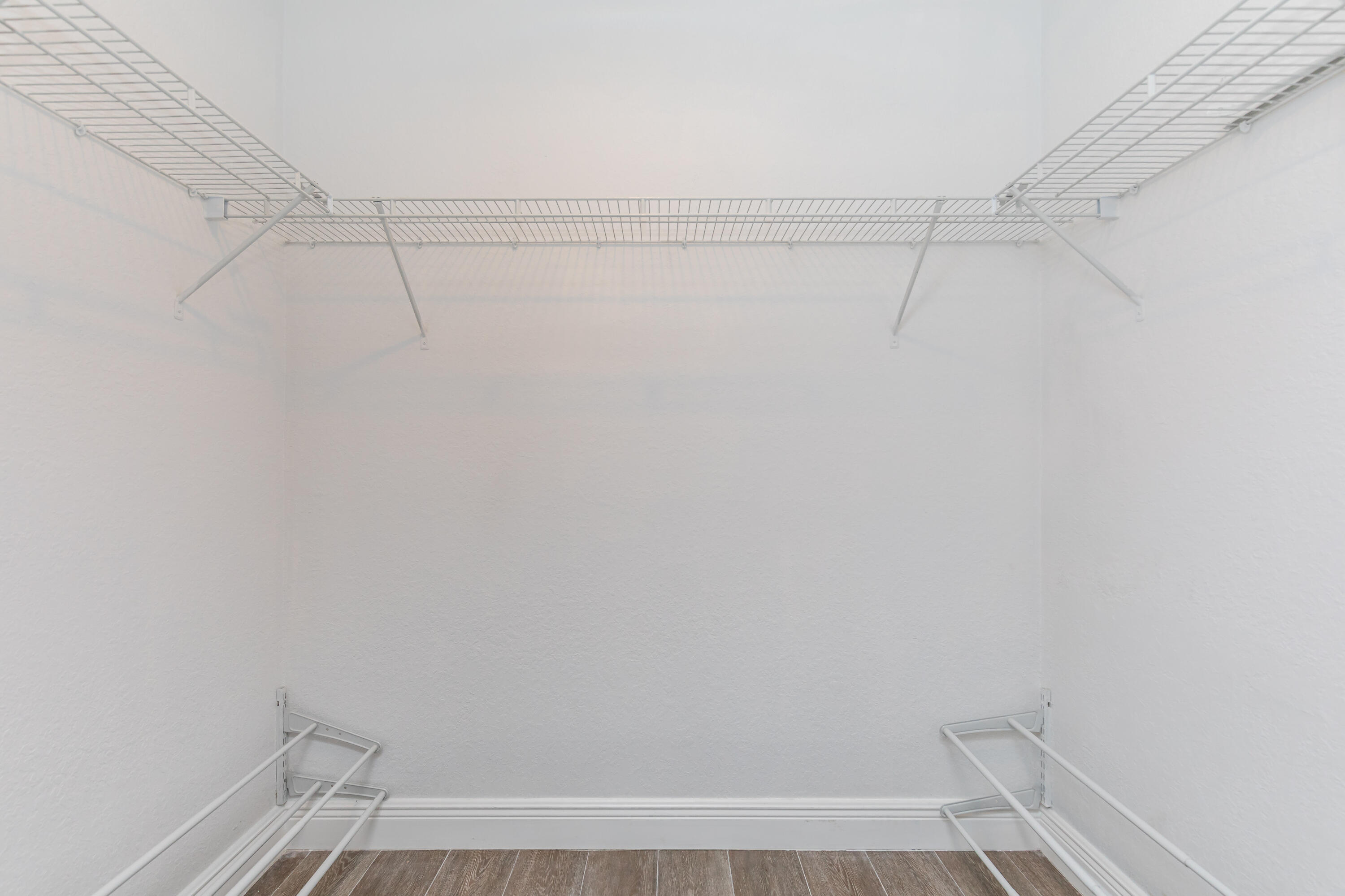 7782 Paddock Place Davie, FL 33328 - Photo 26 of 40 a view of a room with racks on the wall