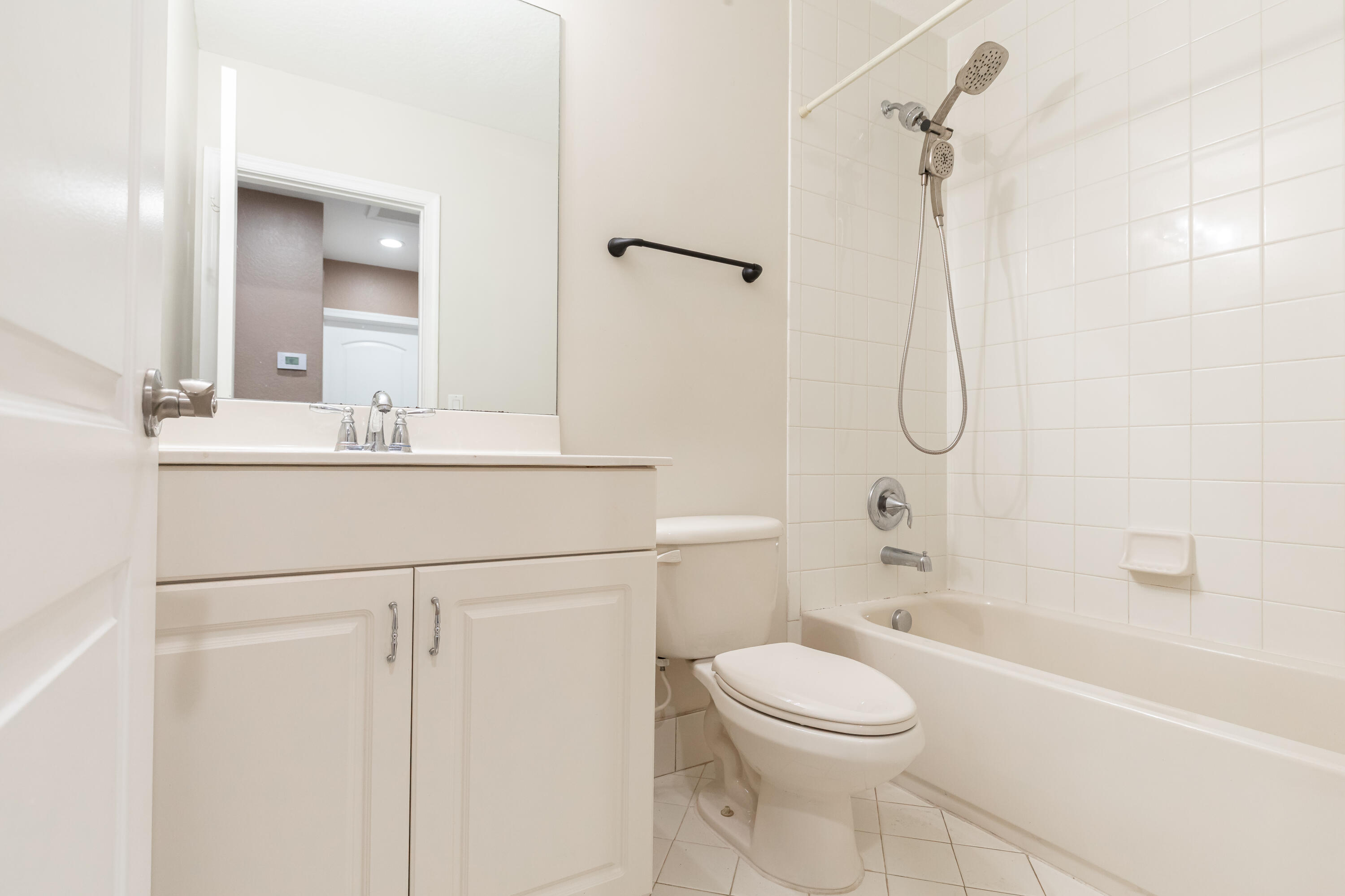 7782 Paddock Place Davie, FL 33328 - Photo 27 of 40 a bathroom with a sink a toilet and shower