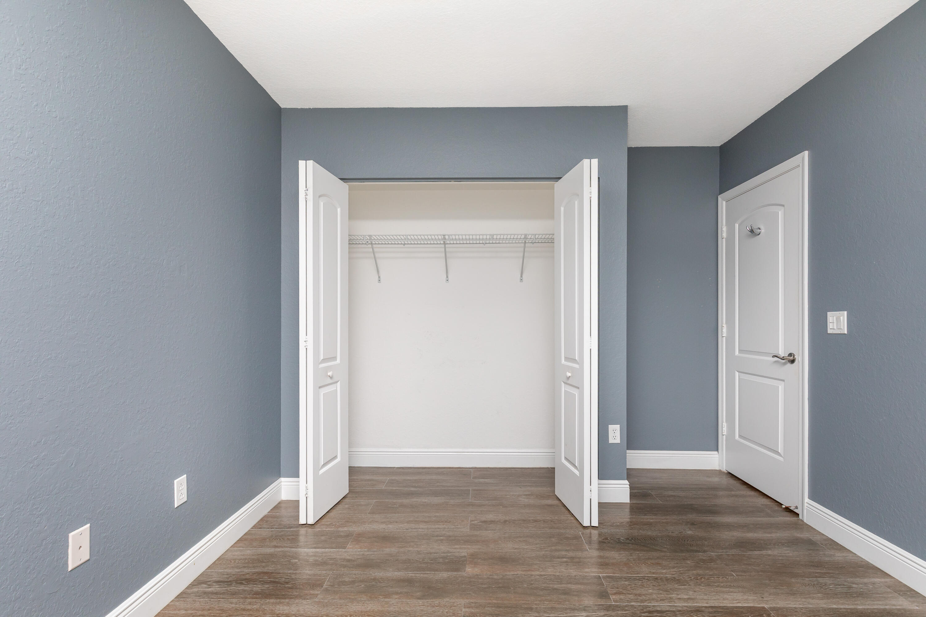 7782 Paddock Place Davie, FL 33328 - Photo 32 of 40 wooden floor and window in a room