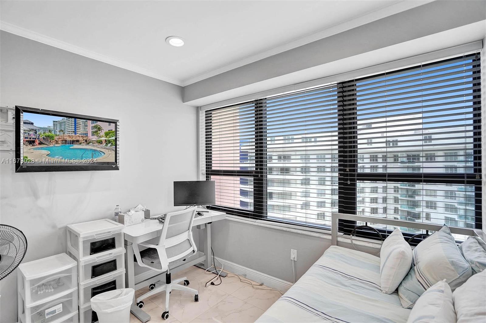5225 Collins Avenue, Unit PH7 Miami Beach, FL 33140 - Photo 25 of 50 a living room with furniture and floor to ceiling windows