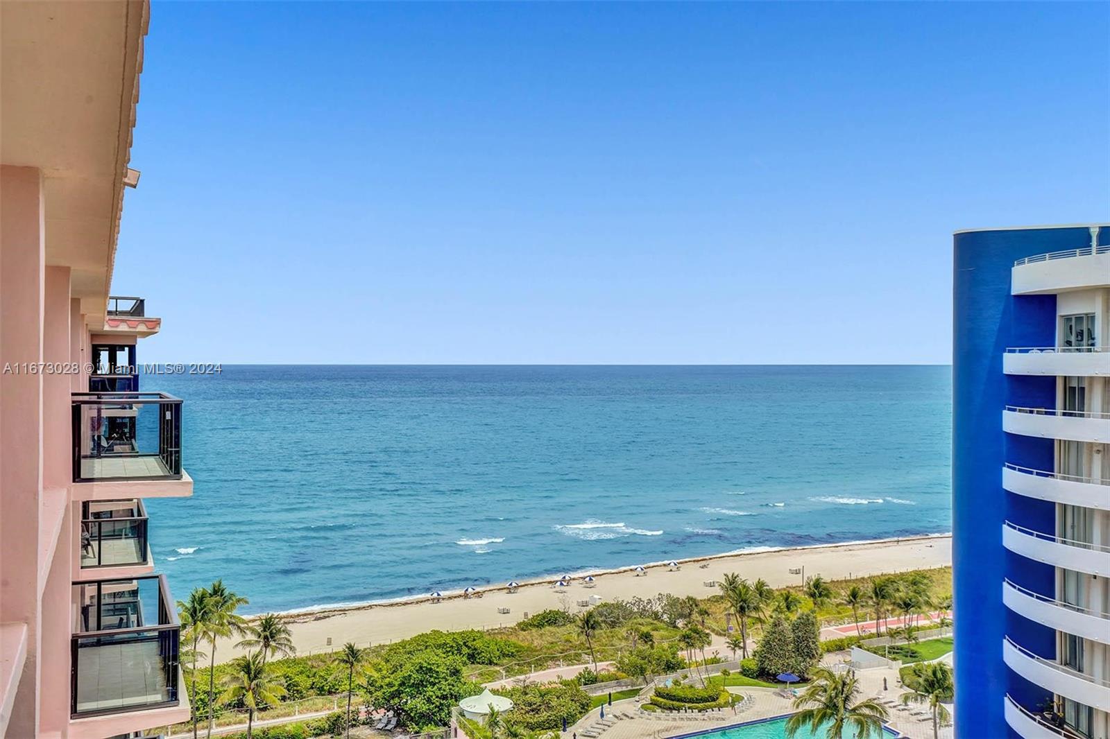 5225 Collins Avenue, Unit PH7 Miami Beach, FL 33140 - Photo 3 of 50 a view of an ocean from a balcony