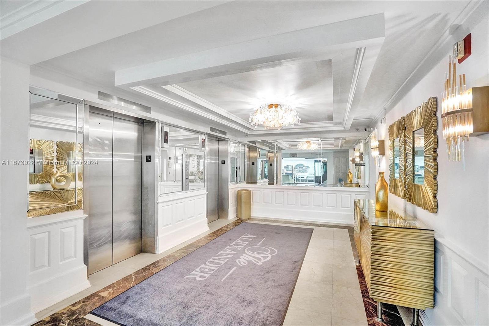 5225 Collins Avenue, Unit PH7 Miami Beach, FL 33140 - Photo 43 of 50 a view of an entryway with a chandelier