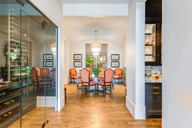 a living room with furniture window and wooden floor