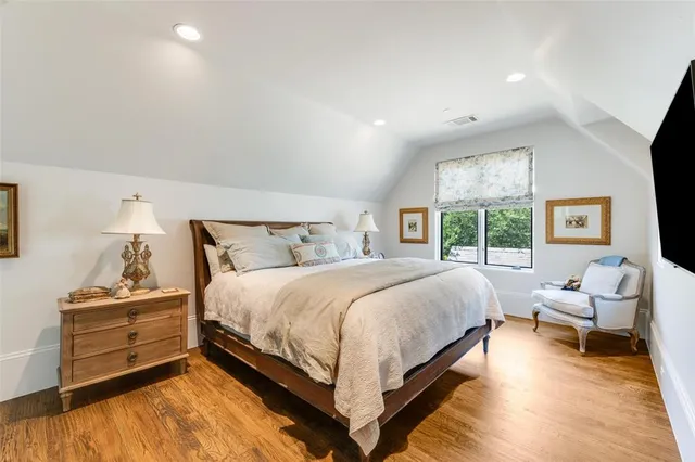 a bed room with a bed and a couch