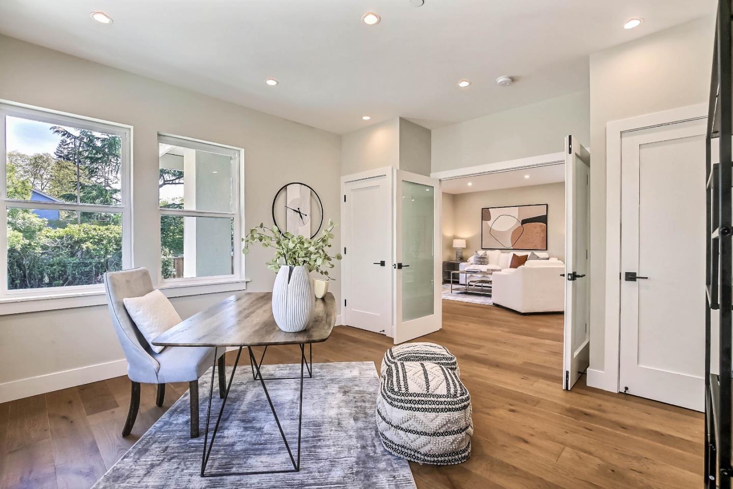 267 Willow Road Menlo Park, CA 94025 - Photo 11 of 24 a living room with furniture and wooden floor