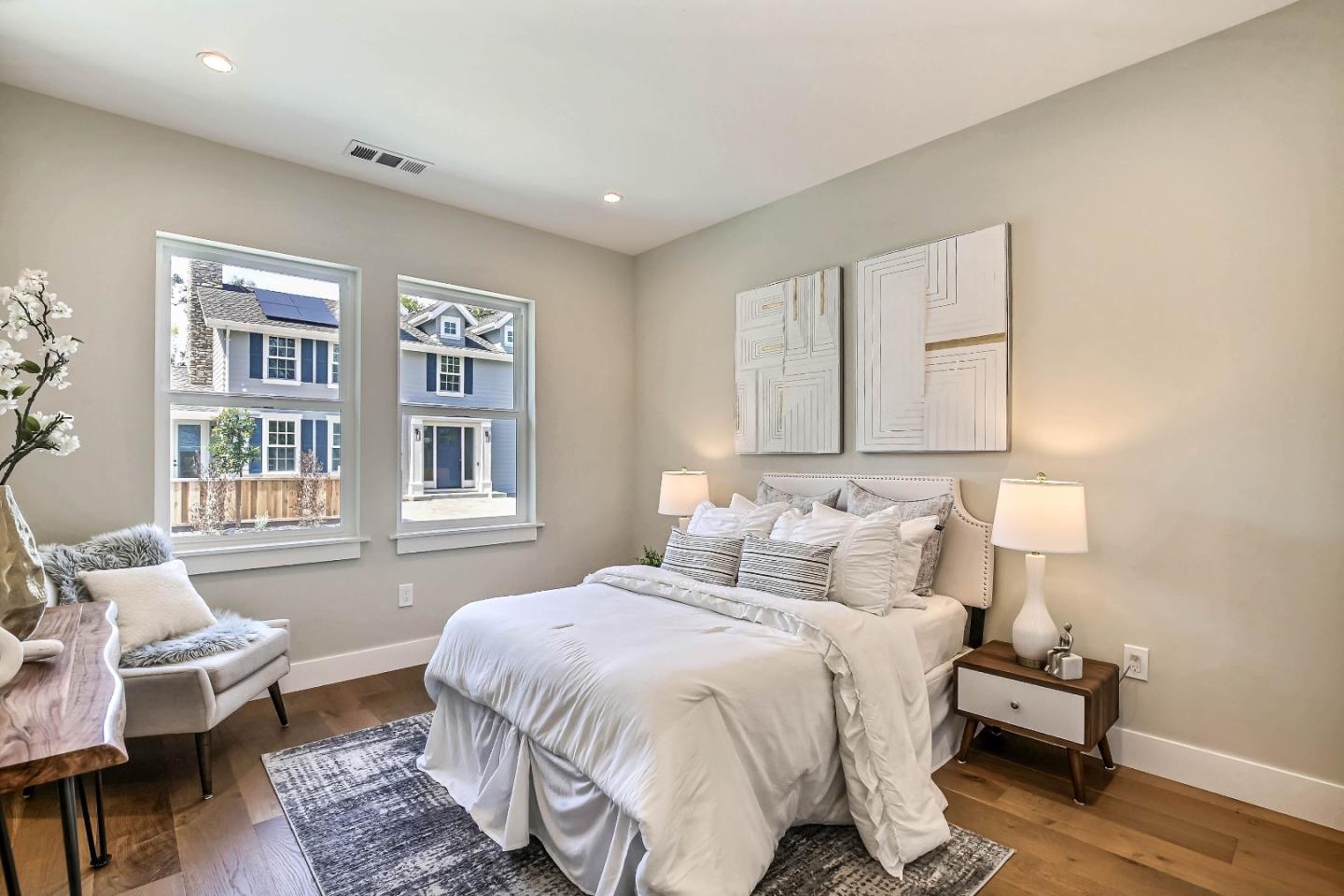 267 Willow Road Menlo Park, CA 94025 - Photo 15 of 24 a bedroom with a bed wooden floor and a window