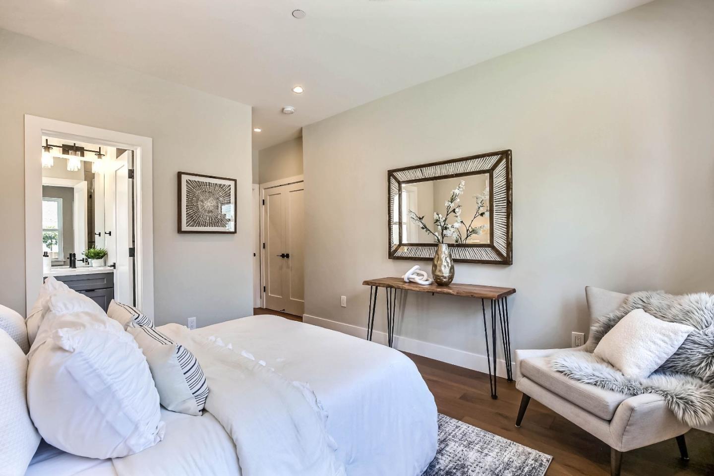 267 Willow Road Menlo Park, CA 94025 - Photo 16 of 24 a bedroom with a bed and a couch