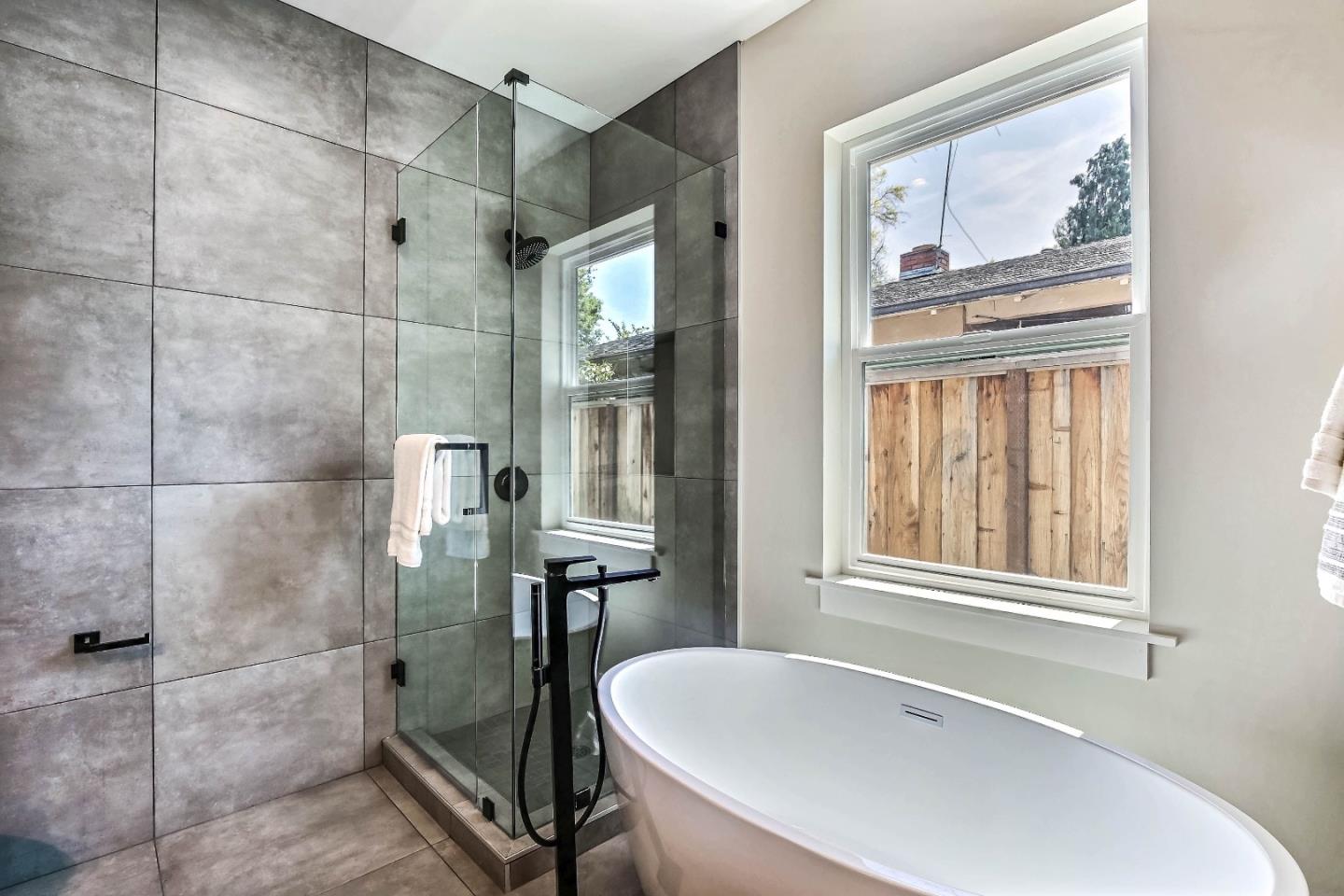 267 Willow Road Menlo Park, CA 94025 - Photo 19 of 24 a bathroom with a tub and shower