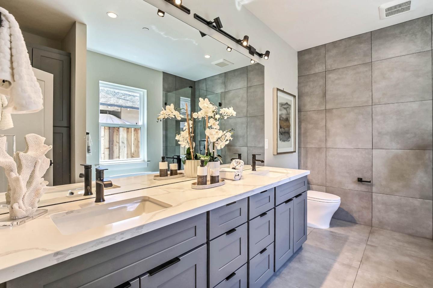 267 Willow Road Menlo Park, CA 94025 - Photo 20 of 24 a bathroom with a double vanity sink toilet and a mirror