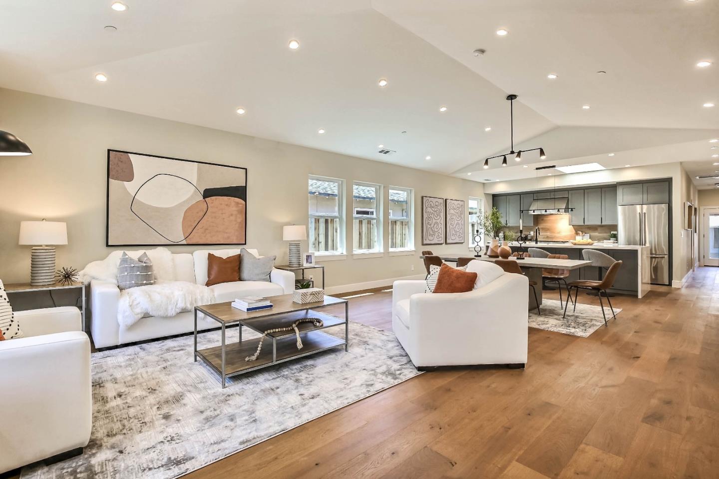 267 Willow Road Menlo Park, CA 94025 - Photo 2 of 24 a living room with furniture kitchen view and a large window