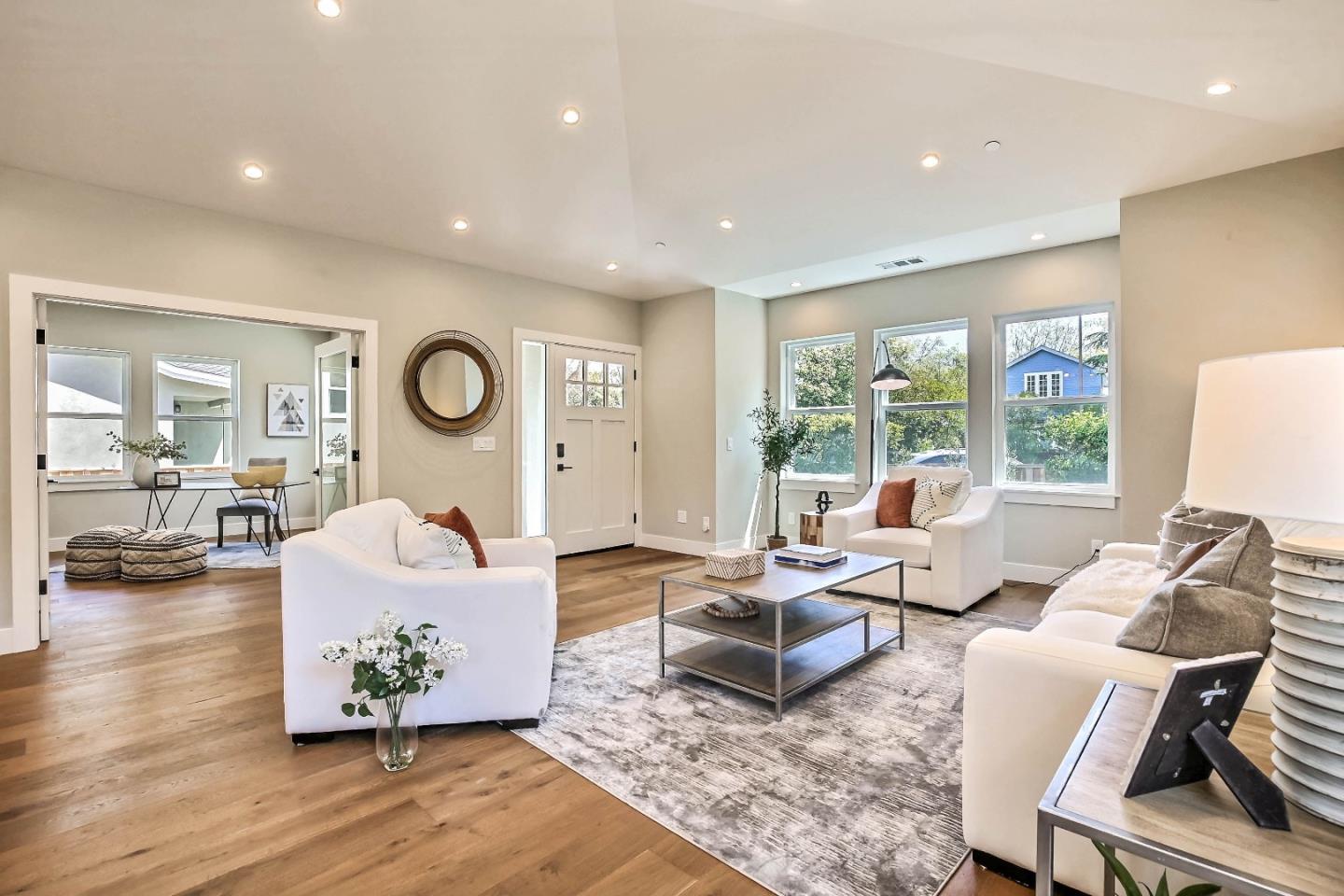 267 Willow Road Menlo Park, CA 94025 - Photo 3 of 24 a living room with furniture and wooden floor