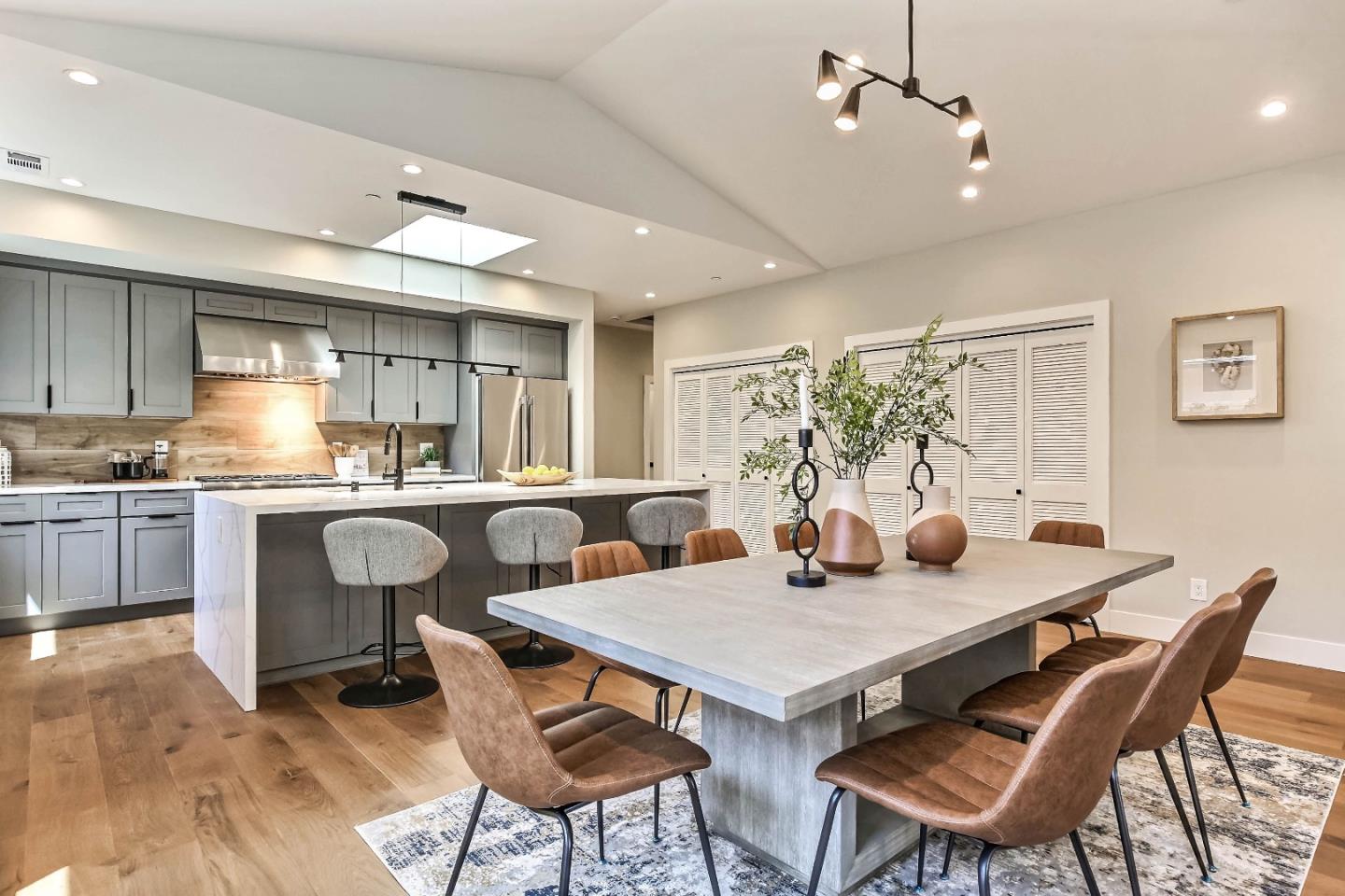 267 Willow Road Menlo Park, CA 94025 - Photo 4 of 24 a view of a dining room with furniture and wooden floor