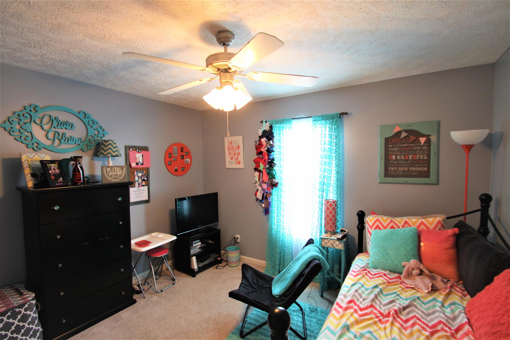 37 Ferrells Loop Road Manchester, TN 37355 - Photo 11 of 18 a bedroom with a bed and a chandelier