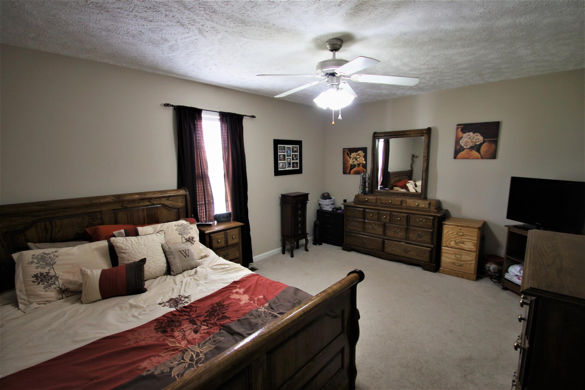 37 Ferrells Loop Road Manchester, TN 37355 - Photo 14 of 18 a living room with furniture and a flat screen tv