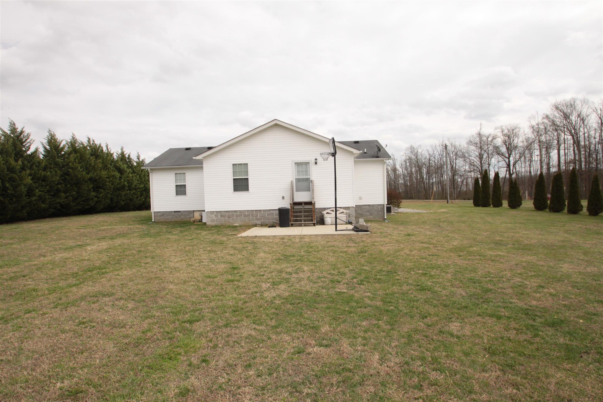 37 Ferrells Loop Road Manchester, TN 37355 - Photo 18 of 18 a view of a house with a yard