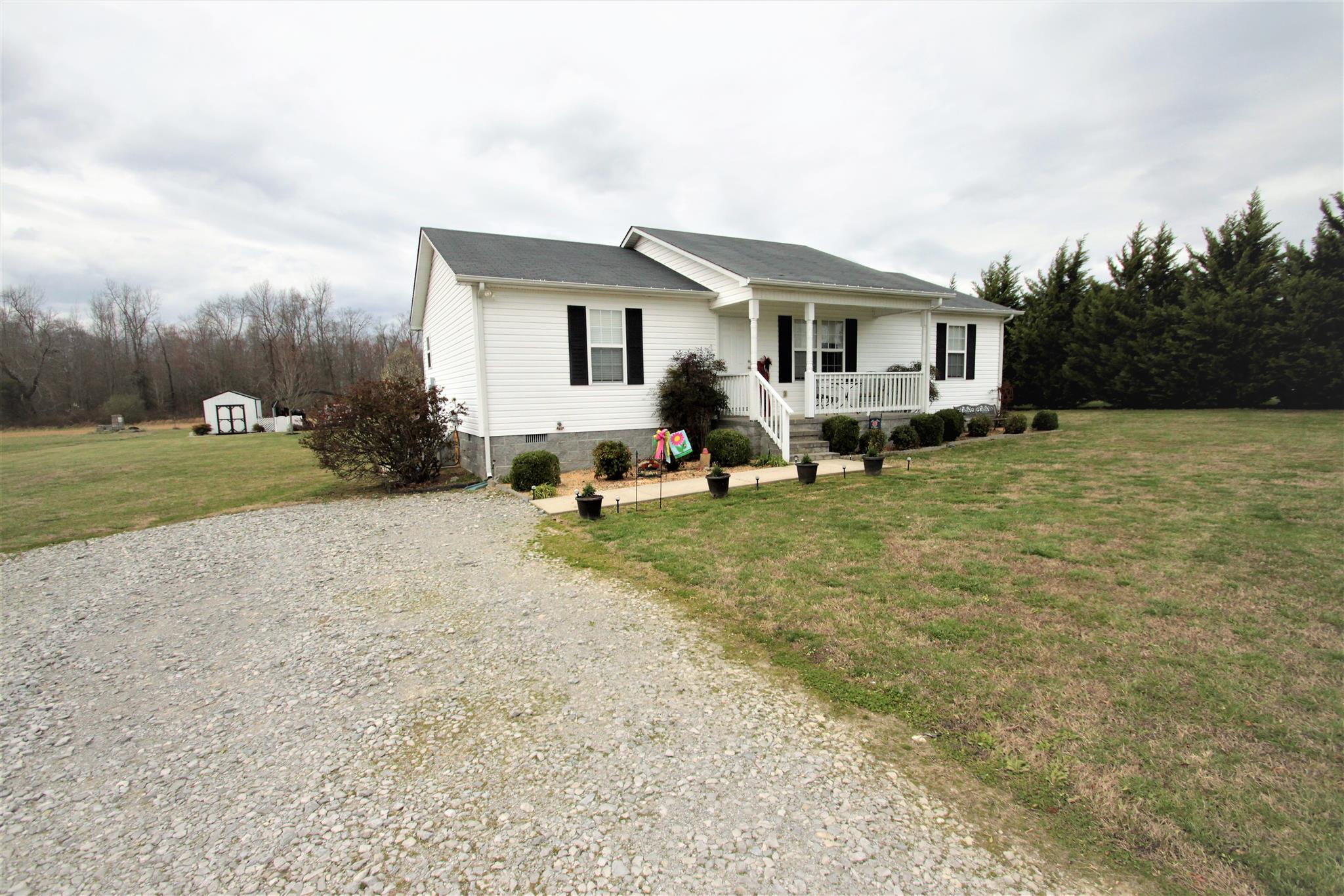 37 Ferrells Loop Road Manchester, TN 37355 - Photo 2 of 18 a view of a house with backyard and sitting area