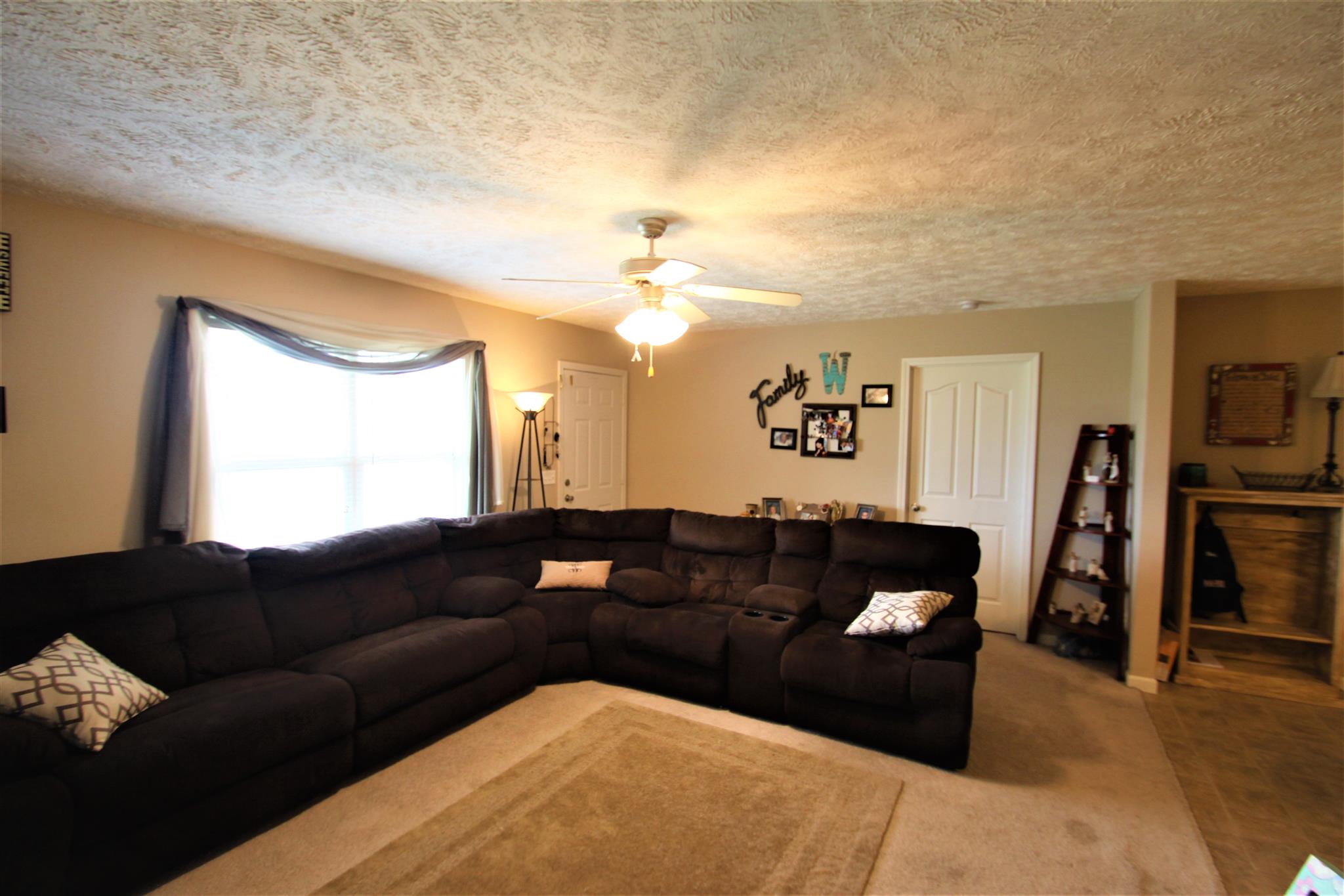 37 Ferrells Loop Road Manchester, TN 37355 - Photo 3 of 18 a living room with furniture and a flat screen tv