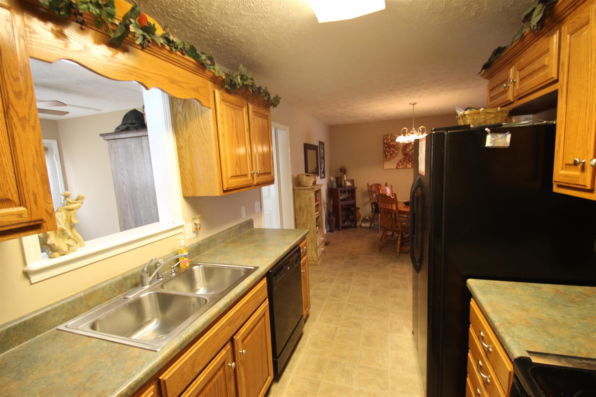 37 Ferrells Loop Road Manchester, TN 37355 - Photo 8 of 18 a bathroom with a granite countertop sink and a mirror