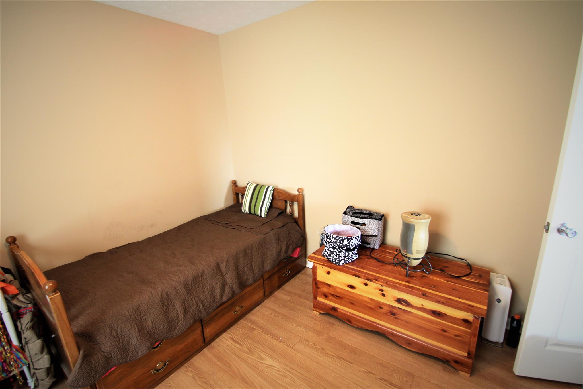 37 Ferrells Loop Road Manchester, TN 37355 - Photo 10 of 18 a bed room with a bed and a night stand