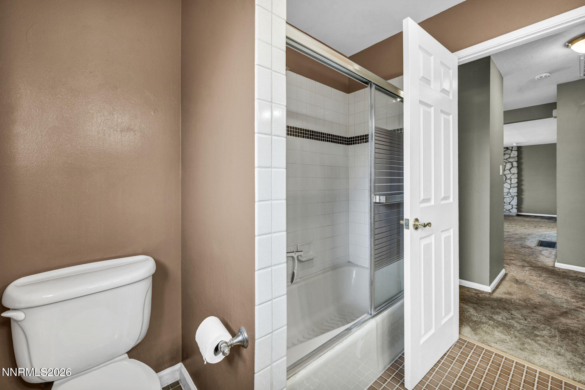 14190 Rim Rock Drive Reno, NV 89521 - Photo 44 of 68 a bathroom with a toilet and a shower