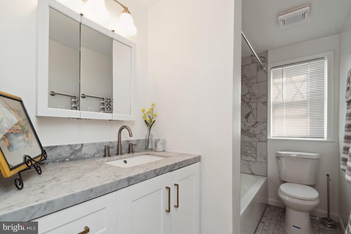 5539 Whitby Road Baltimore, MD 21206 - Photo 15 of 26 Updated kitchen with new Vanity, toilet, and tile