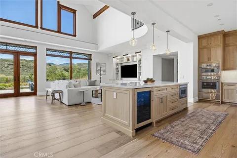a view of kitchen and living room