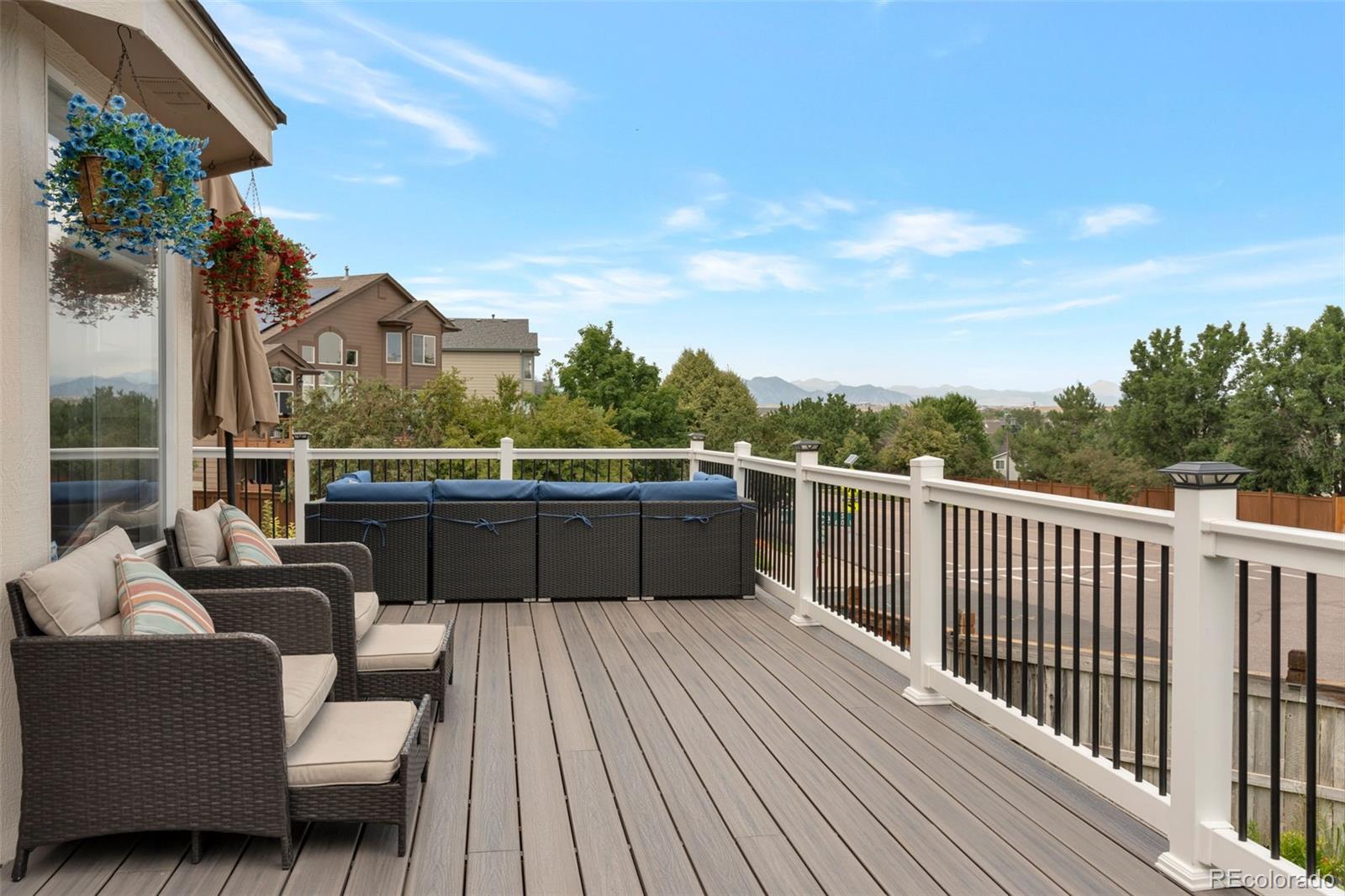 6794 West 98th Circle Westminster, CO 80021 - Photo 33 of 43 a balcony with a couch