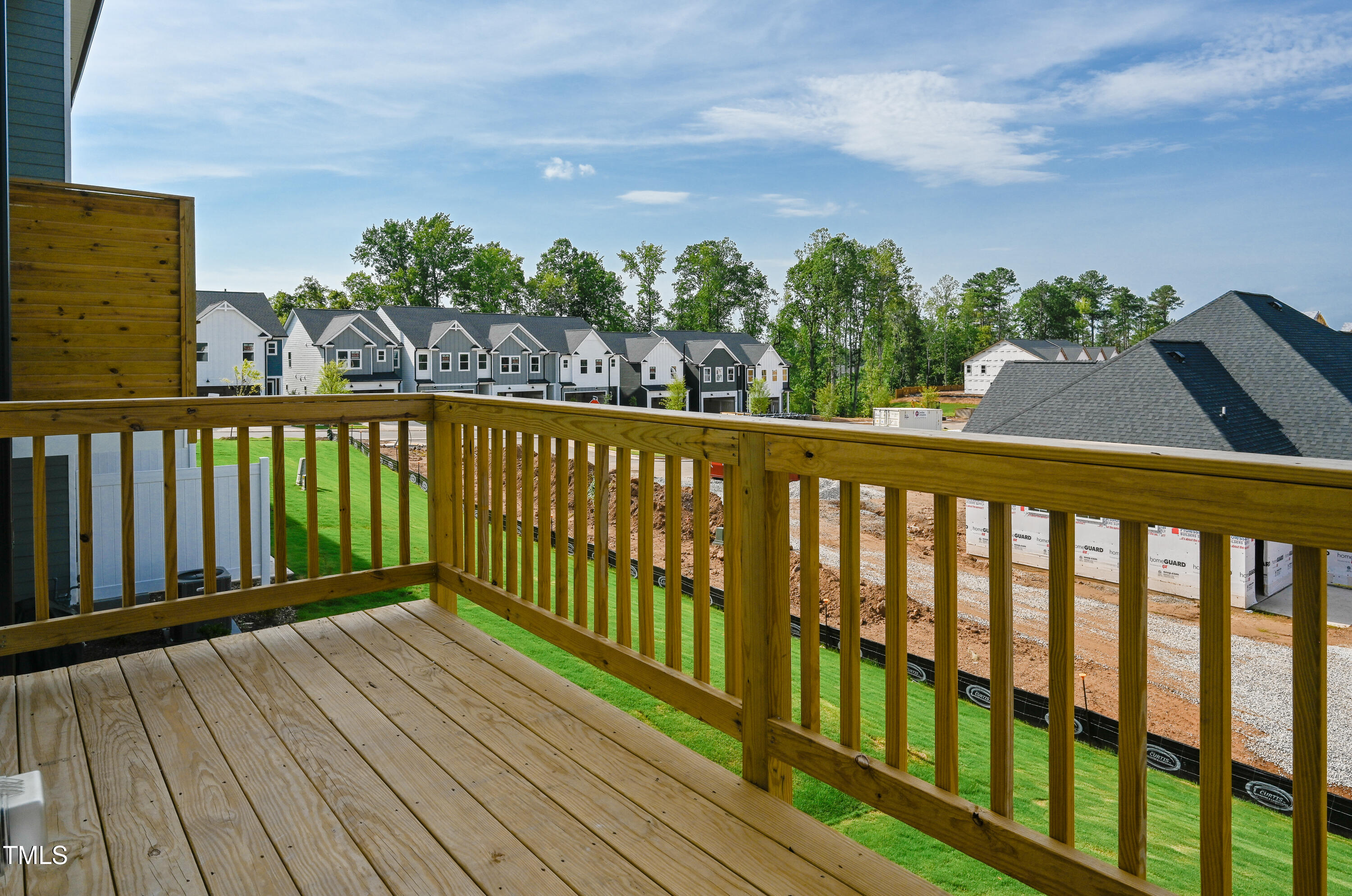 1511 Tamarisk Lane Durham, NC 27703 - Photo 16 of 26 a view of balcony with wooden floor & fence