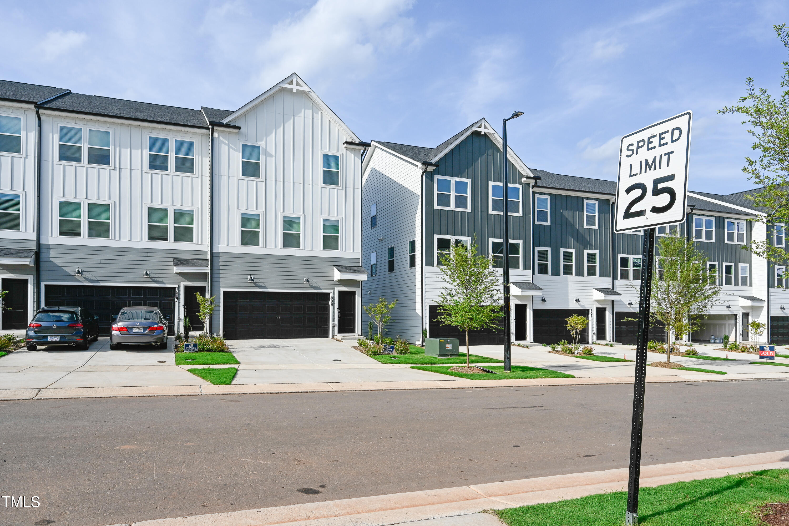 1511 Tamarisk Lane Durham, NC 27703 - Photo 2 of 26 a view of a building with a street